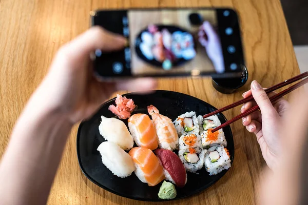 Top View Woman Taking Photo Sushi Table — Stock Photo, Image
