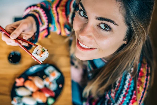 Top View Crop Woman Eating Sushi — Stock Photo, Image