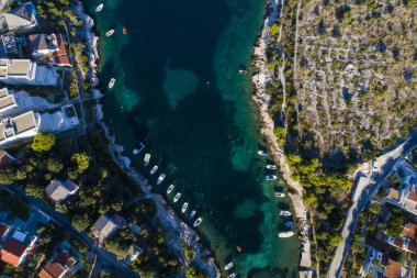 aerial view of the city with bay and boats