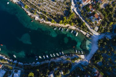 aerial view of the city with bay and boats