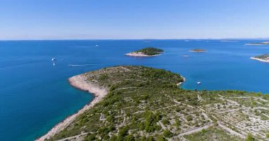 aerial view of island with blue sea water