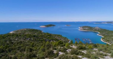 aerial view of island with blue sea water