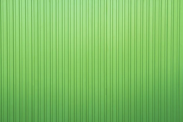 Aluminium dark green  list with metal sheet fence. — Stock Photo, Image