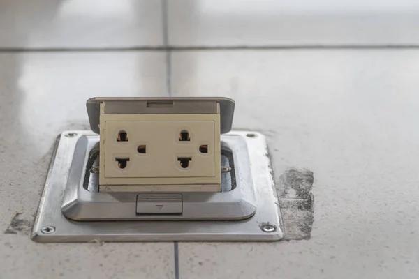 Electrical plugs of white at floor dirty ,16A 250V — Stock Photo, Image