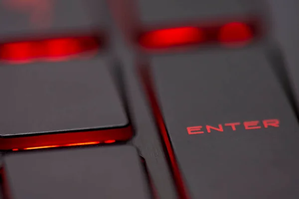 Closeup of enter key or red enter button