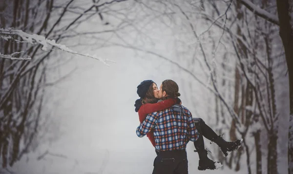 Winter fun couple playful together during winter holidays — Stock Photo, Image