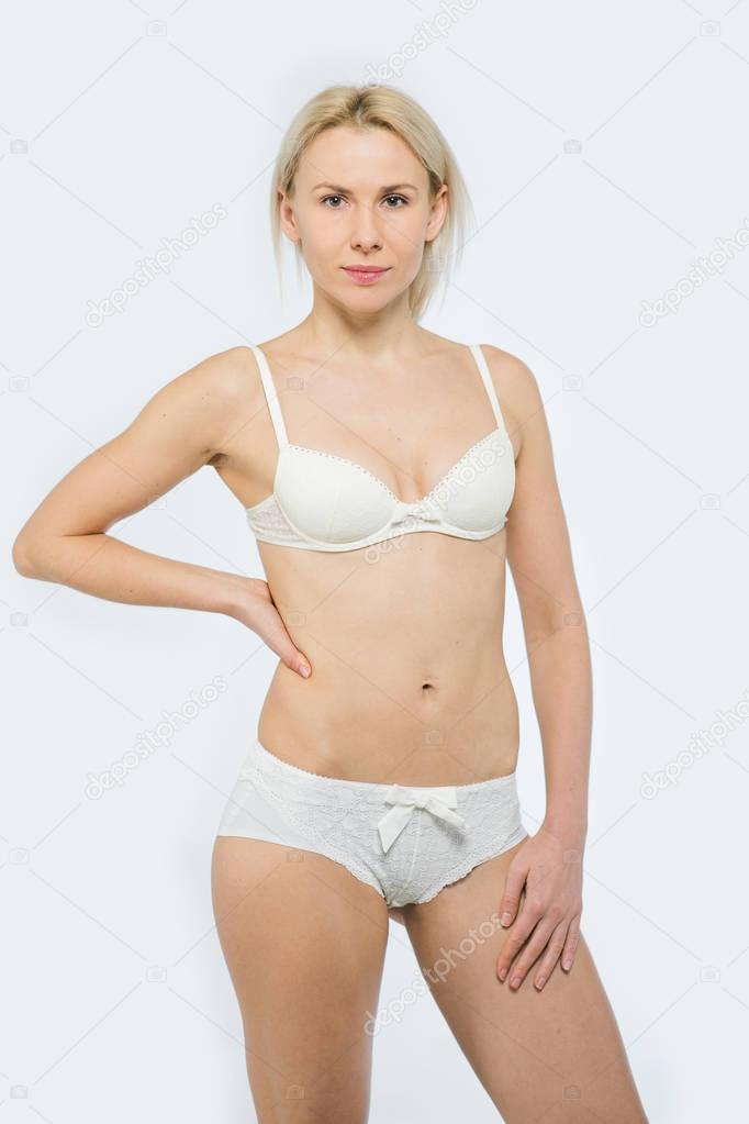 Beautiful slim tanned woman in underwear