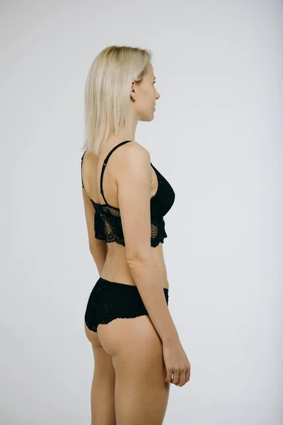 Snap Models back view, Mulher loira corpo bonito em roupa interior sexy, isolado no branco . — Fotografia de Stock