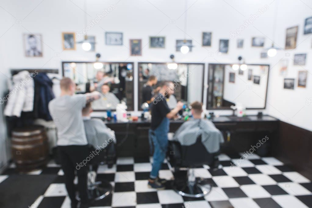 Blurred background of barbershop. An abstract photo of the barbershops. Background concept barberchop. Blurred hairdresser.