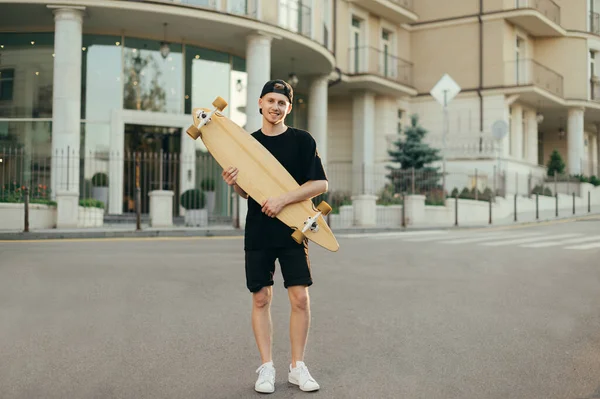 Full Length Portrait Teenager Boy Standing Longboard Hands Outdoors Looking — Stockfoto