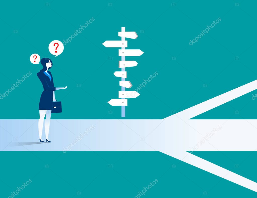Businesswoman standing confused by direction sign