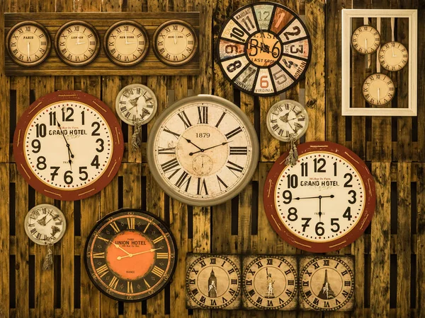 Vintage clock on  wood wall — Stock Photo, Image