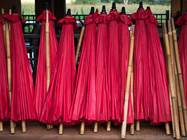 stack of red umbrella