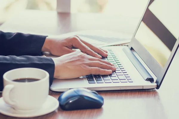 Close Up of woman hands using mobile phone and laptop computer with blank copy space screen for your advertising text message or content business in the Vintage effect. — Stock Photo, Image