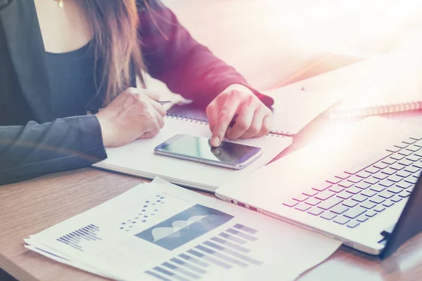 Close Up of woman hands using mobile phone and laptop computer with blank copy space screen for your advertising text message or content business in the Vintage effect. — Stock Photo, Image