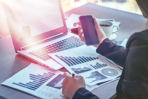 Close Up of woman hands using mobile phone and laptop computer with blank copy space screen for your advertising text message or content business in the Vintage effect. — Stock Photo, Image