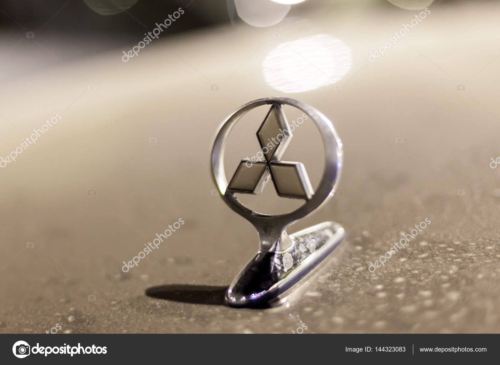 Mitsubishi Motors logo on a car – Stock Editorial Photo © philipus  #144323083