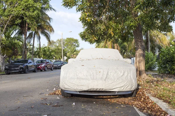Car underneath a car cover — Stock Photo, Image