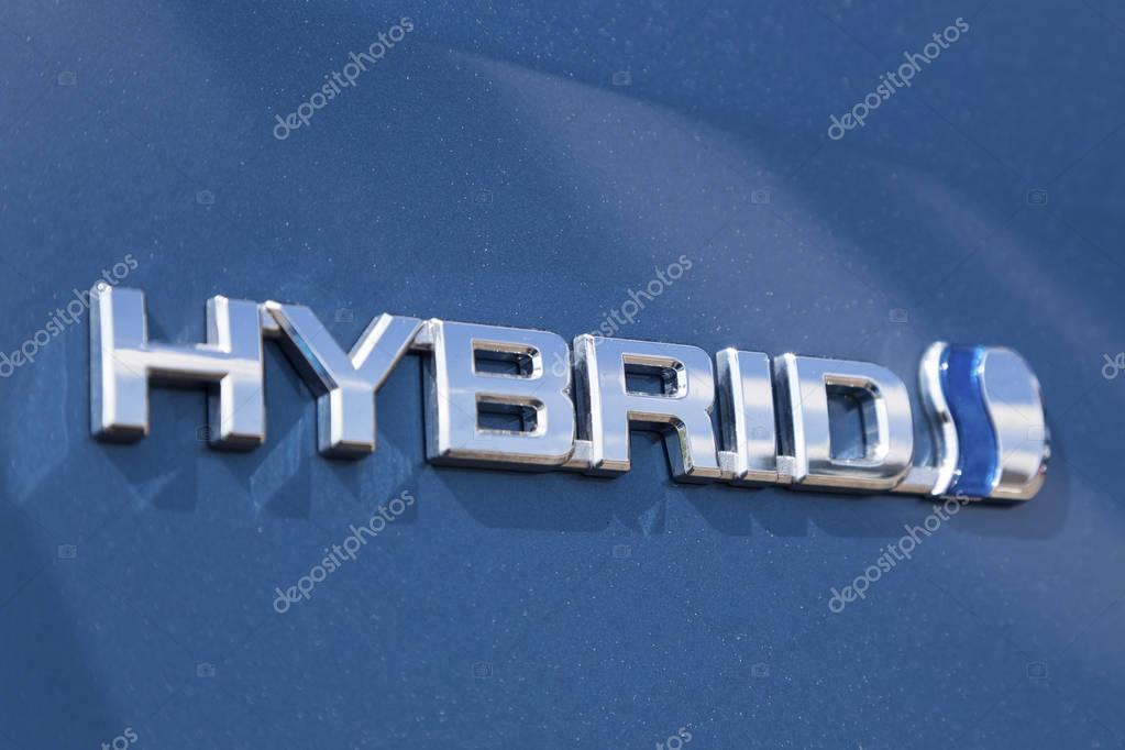 Frankfurt, Germany - March 30, 2017: Logo of a Toyota hybrid car. Toyota is the world's leader in sales of hybrid vehicles.