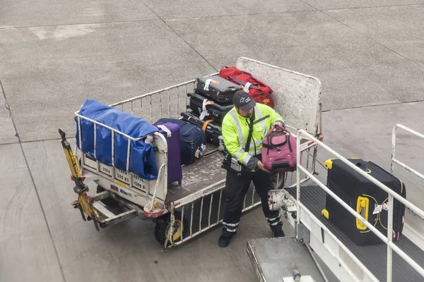 Luggage being loaded to the airplane — Stock Photo, Image