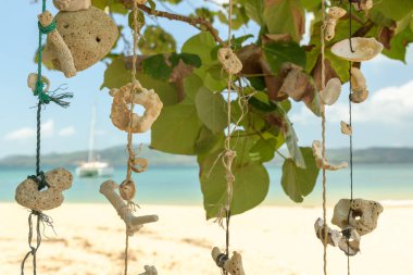 Deniz arka plan asılı kabukları el yapımı Makaleler