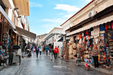 People and souvenirs on the Plaka streets Athens Greece