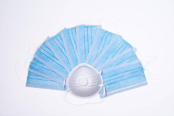 Blue and white protection respirator mask isolated on white background. Protect covid