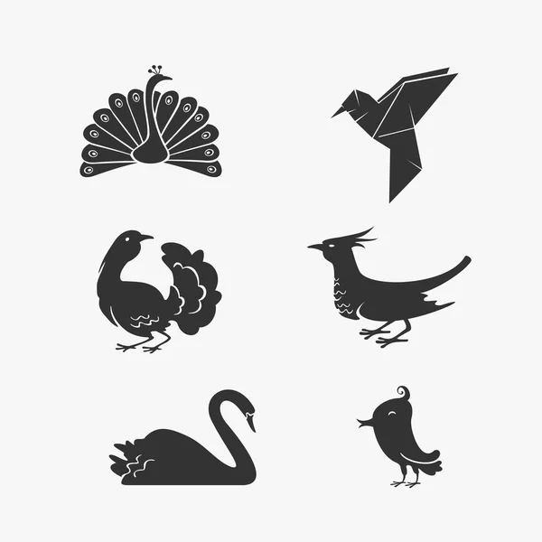 Ensemble vectoriel de symboles d'oiseaux — Image vectorielle