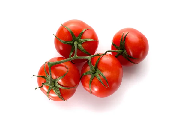 Cuatro tomates rojos sochtyts sobre fondo blanco — Foto de Stock