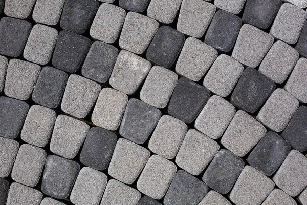 Stone path at the old town in Europe. Texture, close up. — Stock Photo, Image