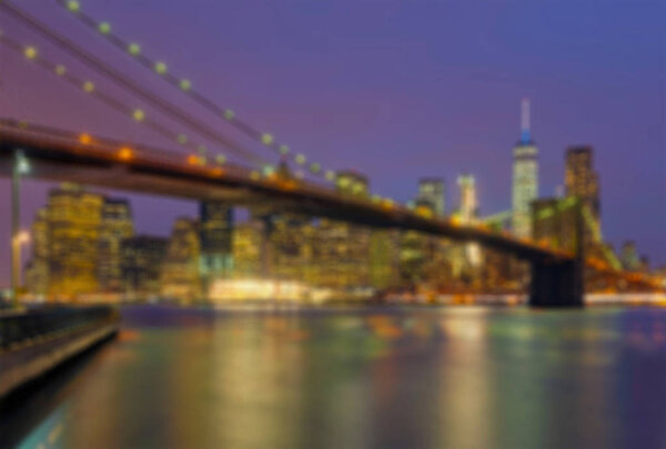 Blurry Bokeh of Brooklyn Bridge at dawn, New York, USA