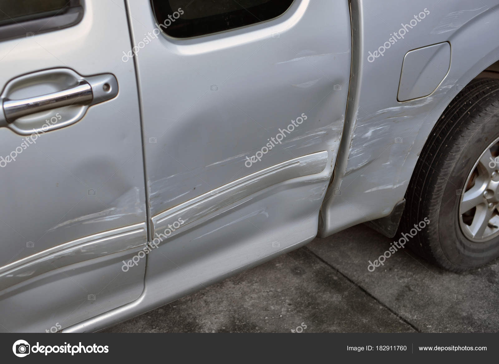 Car body side damage after an road traffic accident, close up Stock
