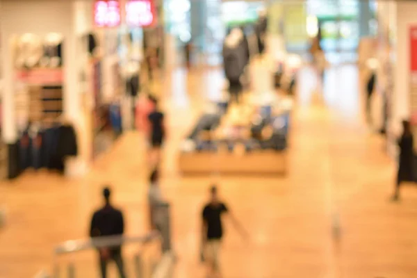 Abstract blurry background of retail shops in shopping mall — Stock Photo, Image