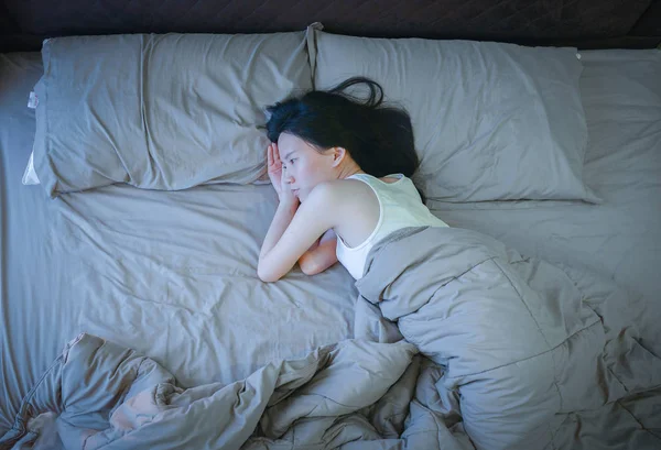 Asian woman suffering from Depression on bed — Stock Photo, Image