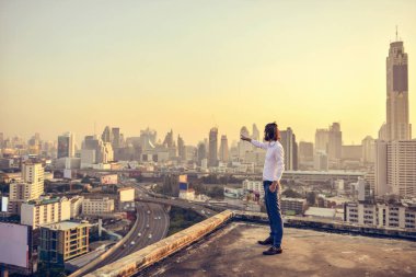Bangkok city adlı batımını Batı iş adamı
