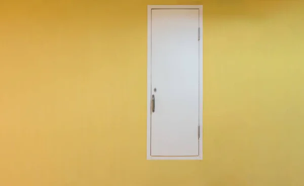White shaft door with yellow wall, Work systems architecture