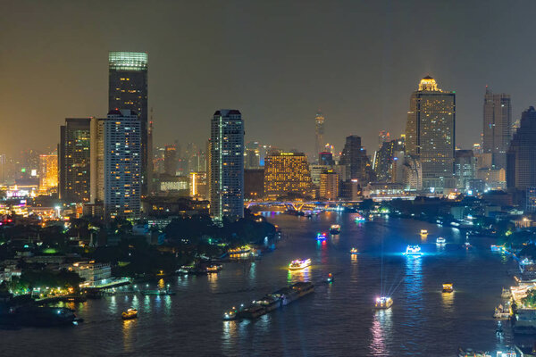 Aerial view of boats and Taksin Bridge with Chao Phraya River, B