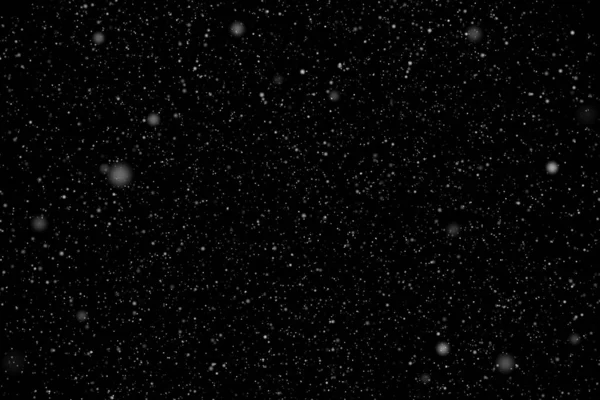 降雪或雪花风暴 白色的圆点落在粉末上 闪闪发亮 覆盖的黑色背景爆炸 摘要说明 — 图库照片