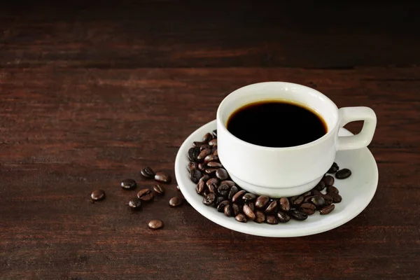 Coffee cup on wood table Stock Picture