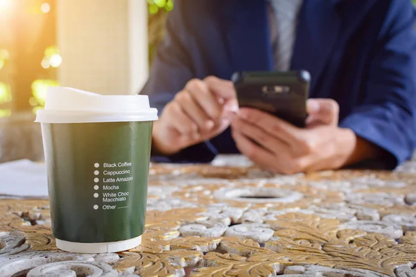 Coffee cup clock and newspaper work on table — Stock Photo, Image