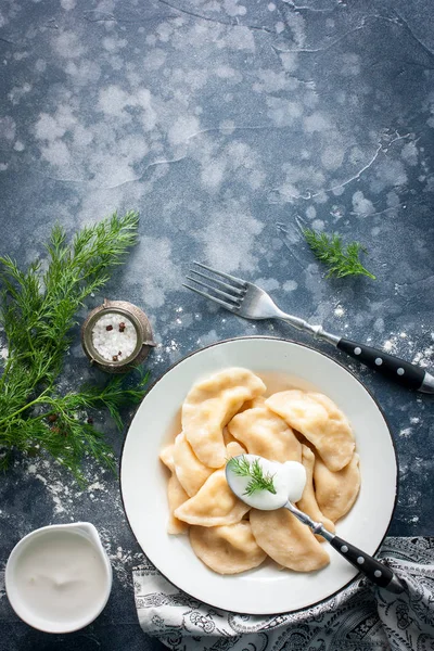 Traditional dumplings in the kitchen of Russia and Ukraine, copy space