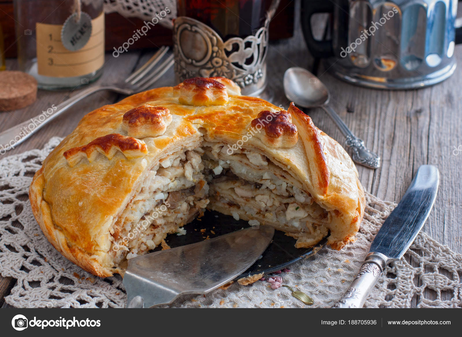 Traditional Russian pancakes pie - kurnik. Stock Photo