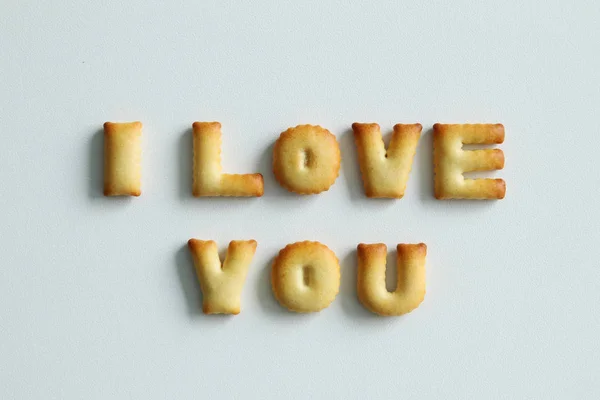 An inscription from the cookies on the white background. Text - I love you. — Stock Photo, Image