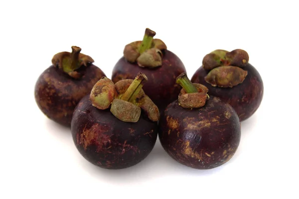 The mangosteen fruit closeup on the white background. Stock Photo