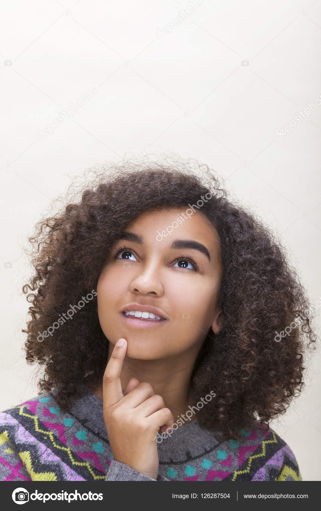Mixed African American Girl Teenager Thinking Stock Photo ©dmbaker 126287504