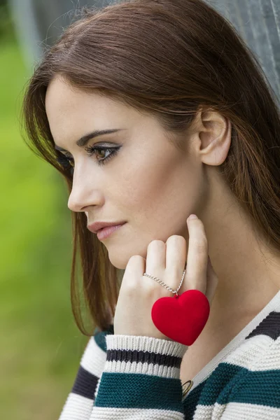 Sad Thoughtful Woman With Red Heart Necklace — Stock Photo, Image