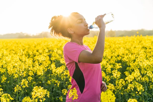 Mixed Race African American Girl Teenager Runner Drinking Water — Stock Photo, Image