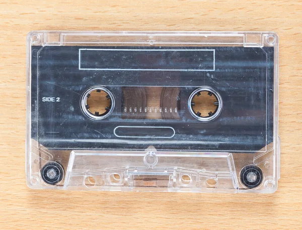 Compact Cassette Audio Tape Wooden Background — 스톡 사진