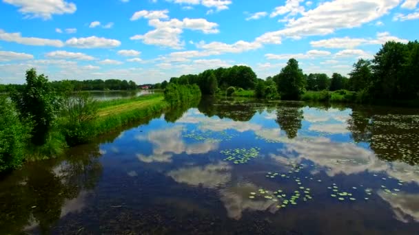 Flight drone over the ponds toward the horizon. — Stock Video