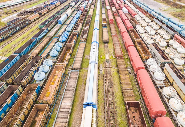 Railway wagons seen from the bird\'s eye view. A convergent perspective created by colorful railway wagons.